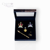 Set of miniature crowns and regalia in a 'Crowns & Regalia' box on a white background.